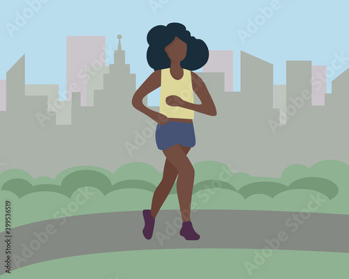 Black African woman running in the city. Sports training on the street. A runner on the move. Marathon and long runs in the street. running and fitness every day