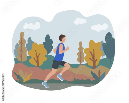 A man runs in an autumn park. Sports training on the street. Runner in motion. Marathon and long runs outside. running and fitness every day in all weathers. comfortable athletic clothing for running.