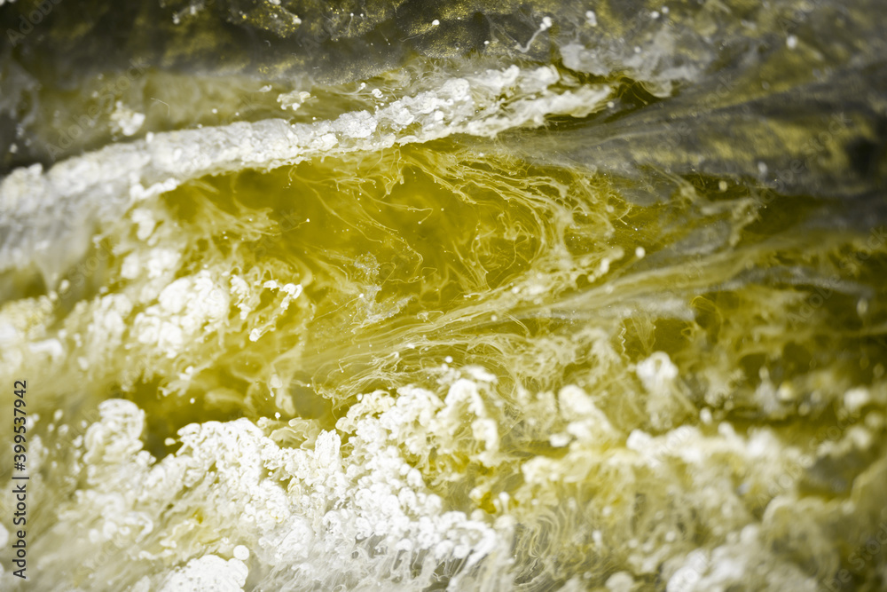Abstraction. Fluid art. Yellow and grey. Natural luxury. The style includes swirls of marble or ripples of agate. Very beautiful yellow paint with the addition of gold powder Abstraction. Fluid art. Yellow and grey. Natural luxury. The style includes swirls of marble or ripples of agate. Very beautiful yellow paint with the addition of gold powder