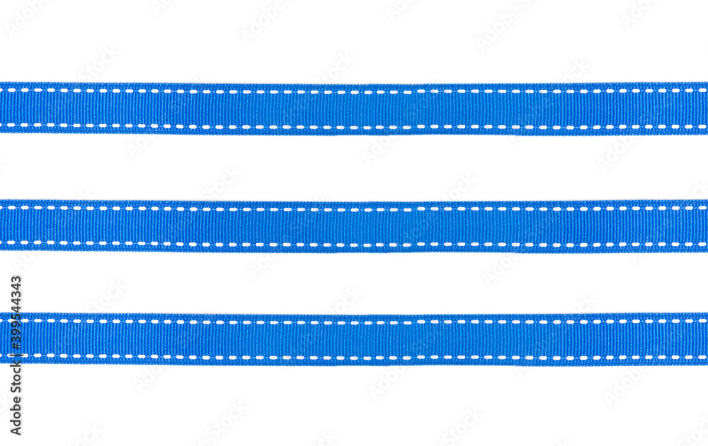 
Blue fabric ribbons with white dotted lines isolated on white background