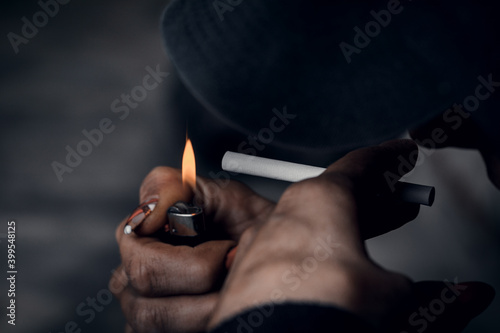 The concept of substance abuse, drug addiction and bad habits. People smoke cigarettes and use drugs.