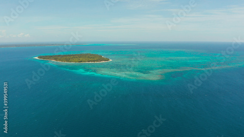 Tropical islands with white beaches and atolls and coral reef, aerial view. Summer and travel vacation concept.