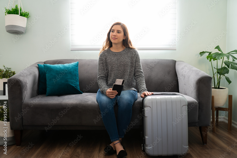 Attractive woman at home ready to go on a trip Attractive woman at home ready to go on a trip