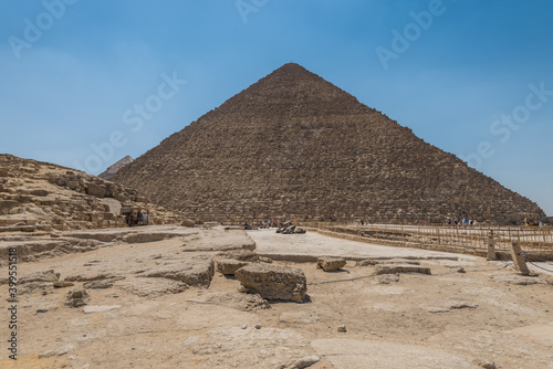 Lots of tourists visiting the Pyramid of Khufu in The Giza pyramid complex, an archaeological site on the Giza Plateau, on the outskirts of Cairo, Egypt