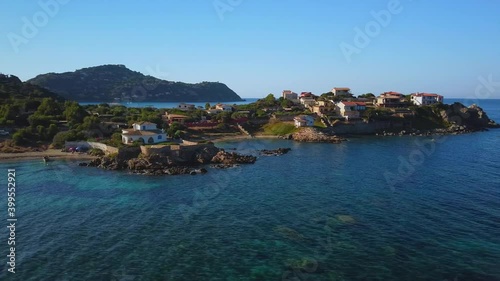 Timelapse Hyper-lapse Group of villas village residence holiday home promontory cape headland foreland nature Sardinia coast Sardinian landscape Baccu Mandara beach mediterranean sea aerial drone shot photo