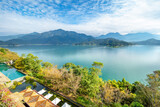 The aerial view of Sun Moon Lake with swimming pool and resort villa in Yuchi Township, Nantou, Taiwan.