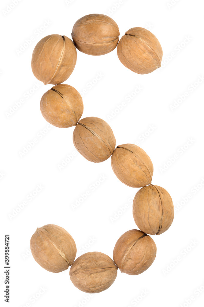 Walnuts lined in the shape of the letter Walnuts lined in the shape of the letter
