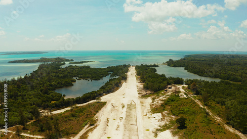 Construction of the runway of the local airport on a tropical island. Construction of a landing strip. Balabac, Palawan, Philippines. photo