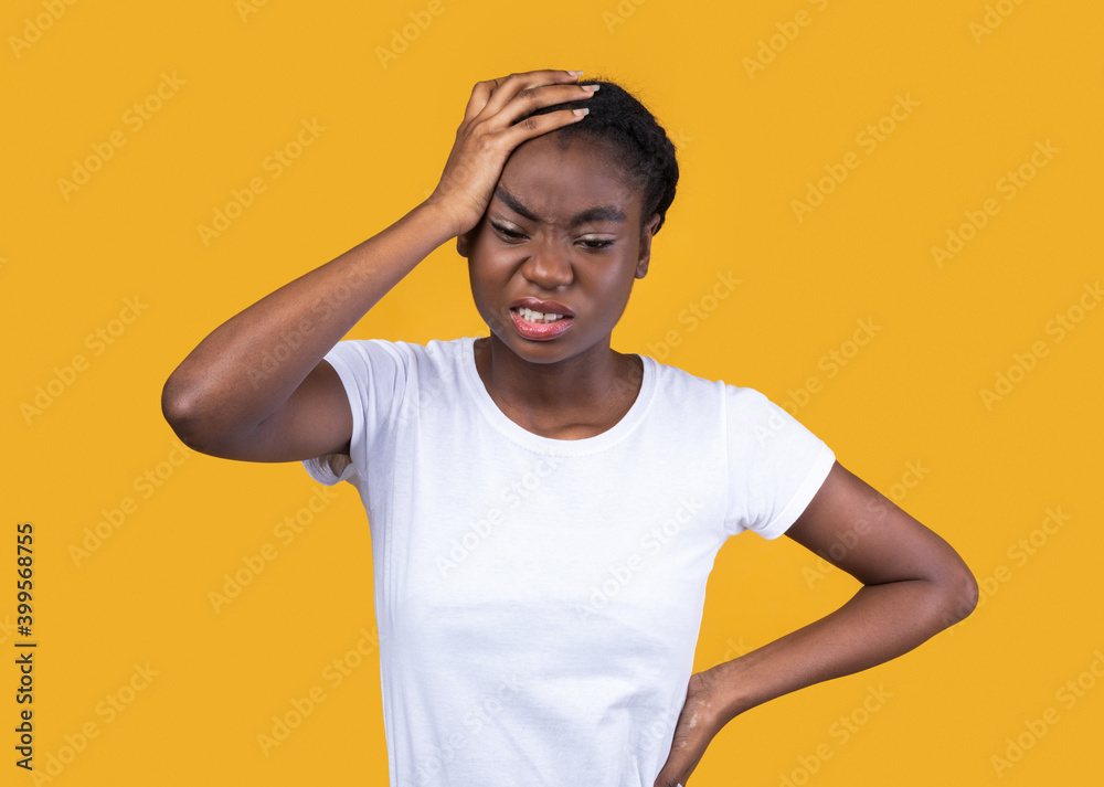 African American Woman Suffering From Severe Headache, Yellow Background African American Woman Suffering From Severe Headache, Yellow Background