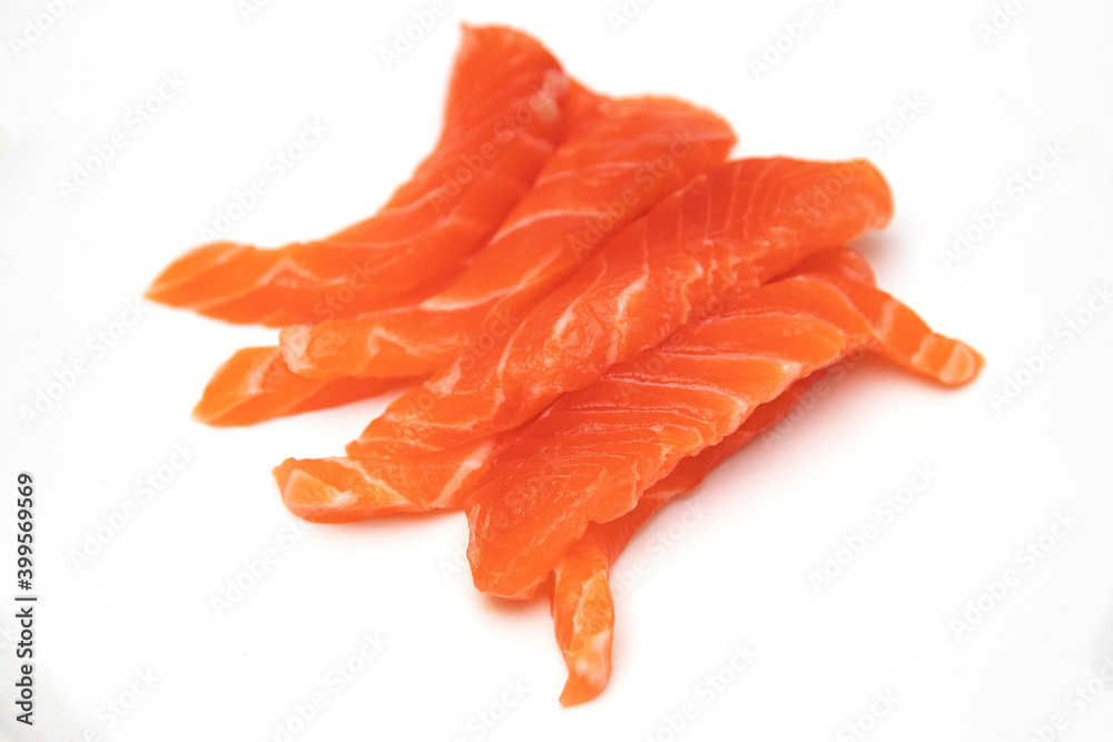 Fresh salmon fillet piece on isolated white background. Fresh salmon fillet piece on isolated white background.