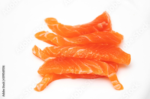 Fresh salmon fillet piece on isolated white background.