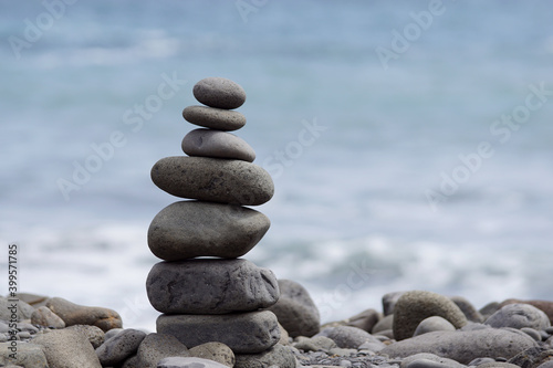stone stack, tower or pyramid of stones on the beach, balance
