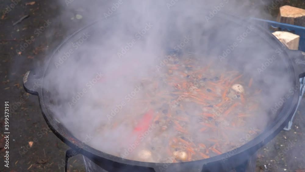 Hot steaming stew with vegetables for traditional pilaf Hot steaming stew with vegetables for traditional pilaf