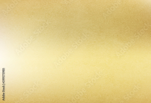 Shiny gold foil texture. Golden background.