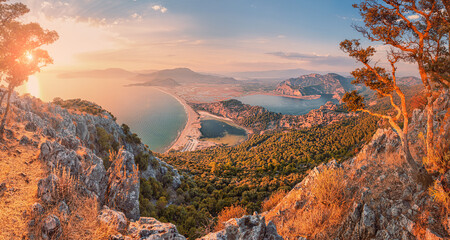 Stunning panoramic view from the top of the mountain to the blue bay and lagoon near the town of Dalyan in Turkey. Famous Mediterranean resorts and the wonders of nature