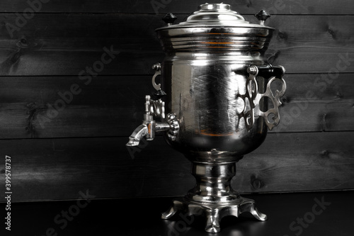 Vintage samovar on wooden background