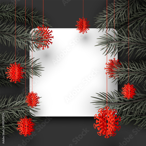 Fir branches with hanging red covid toys.