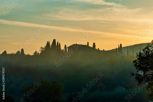 sunset over the Chianti hills of Siena in Tuscany in autumn