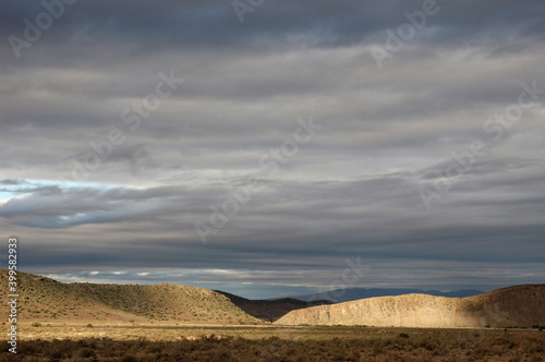 A late afternoon sunshine in an overcast Karoo