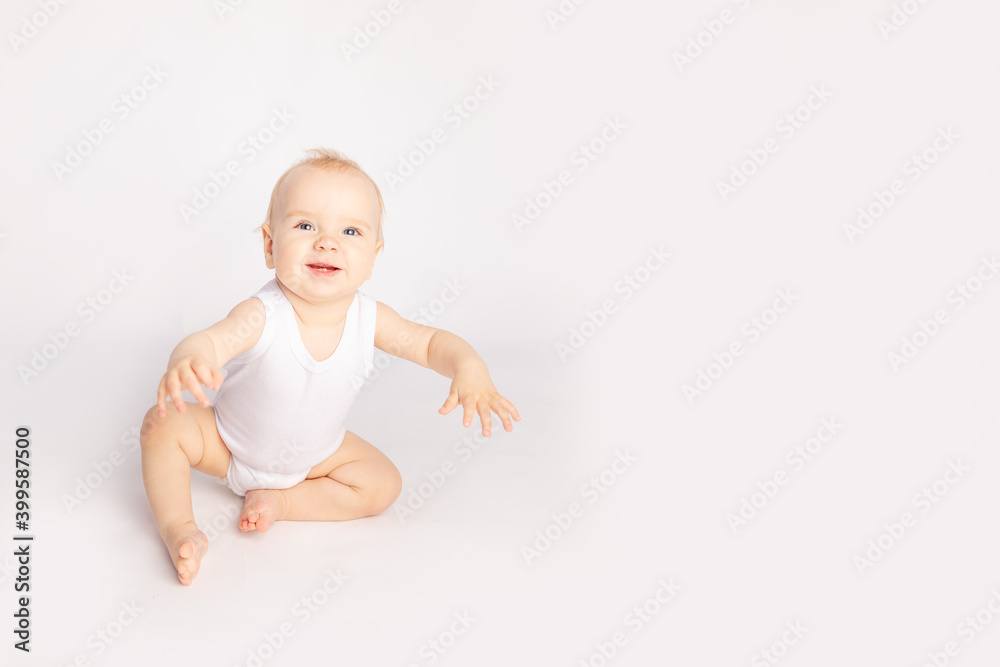 happy little child sitting on white isolated background happy little child sitting on white isolated background