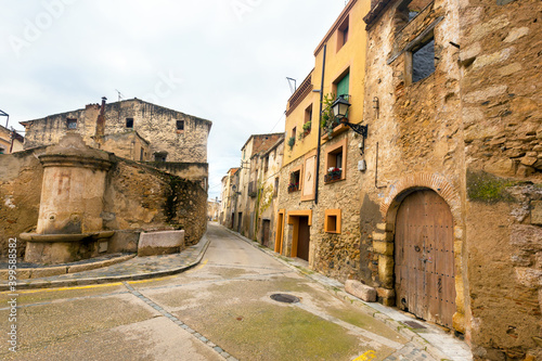Narrow streets of Monblanc city at cloudy day in Catalonia