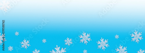 Christmas pattern of white snowflakes on a blue background. Concept banner frame border background for Christmas and New Year.