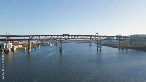Wallpaper Mural Rising aerial view showing movement of traffic and pedestrians on Hawthorne Bridge over Willamette River in Portland, Oregon. Torontodigital.ca
