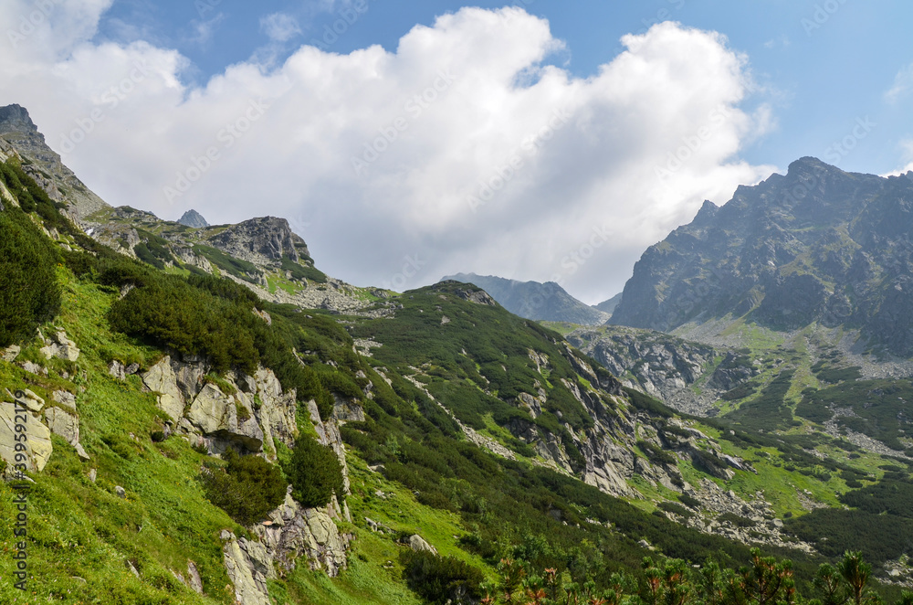 Beautiful summer landscape with rocky mountain peaks at High Tatras mountains, Slovakia. Hiking adventure.