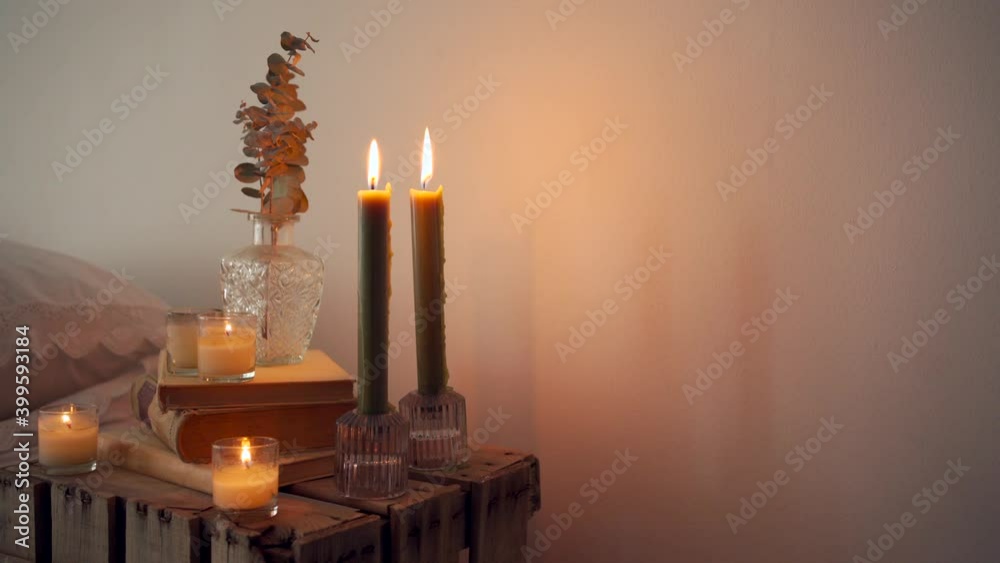 Rustic bedside table with books and decorations