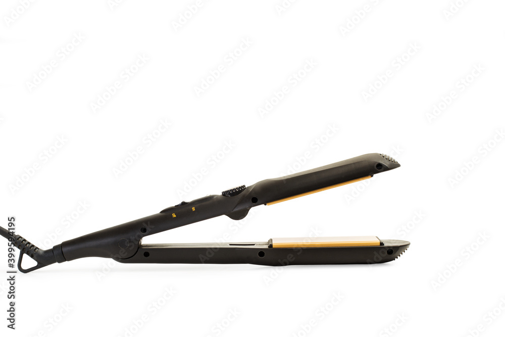 Plancha de pelo sobre un fondo blanco liso y aislado. Vista de frente. Copy space. Concepto: Cuidado del cabello, peinado, salón de belleza, peluquería. Plancha de pelo sobre un fondo blanco liso y aislado. Vista de frente. Copy space. Concepto: Cuidado del cabello, peinado, salón de belleza, peluquería.