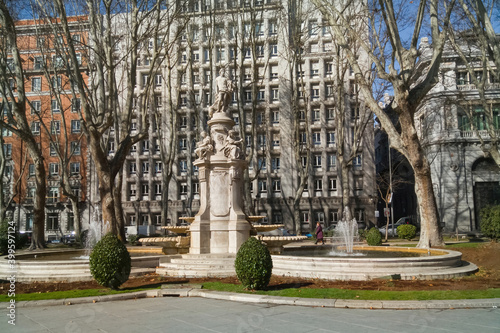 Monumental fountain of Madrid dedicated to the God Apollo and with allegories of the four seasons