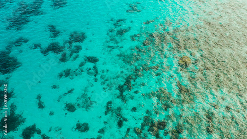 Sea water surface in lagoon copy space for text. Top view transparent turquoise ocean water surface. background texture