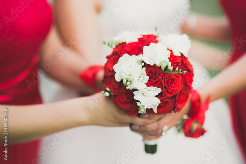 Fototapeta Naklejka Na Ścianę i Meble -  Bride holding big and beautiful wedding bouquet with flowers