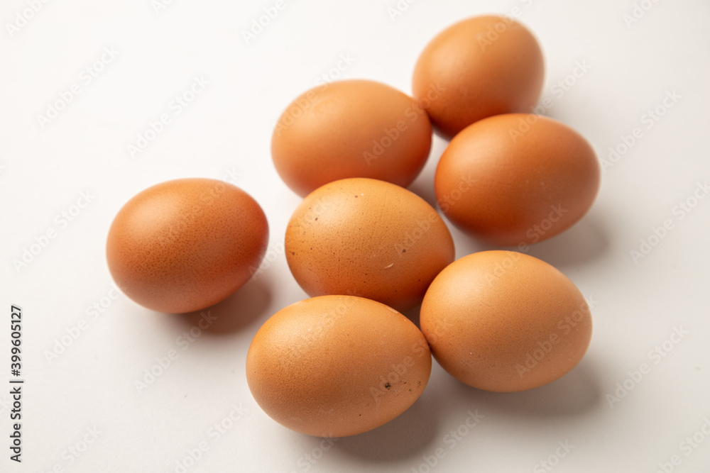 brown chicken eggs on color background brown chicken eggs on color background
