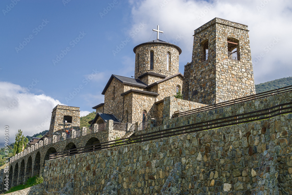 Sunny view of Alanian Male Holy Dormition Monastery in the village Alanian Hidikus. North Ossetia, North Caucasus. Russia.