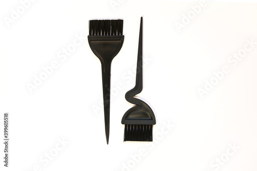 black brushes-hair coloring brushes used in salons, on a white background. 