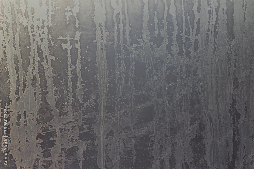 Abstract winter background, frosty pattern on window glass in retro style. Frozen glass with textures and patterns. Copy space, background. Abstract winter background, frosty pattern on window glass in retro style. Frozen glass with textures and patterns. Copy space, background.