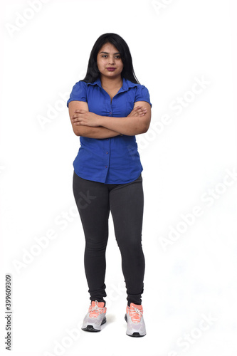 full portrait of a latin woman casual clothes arms crossed on white background photo