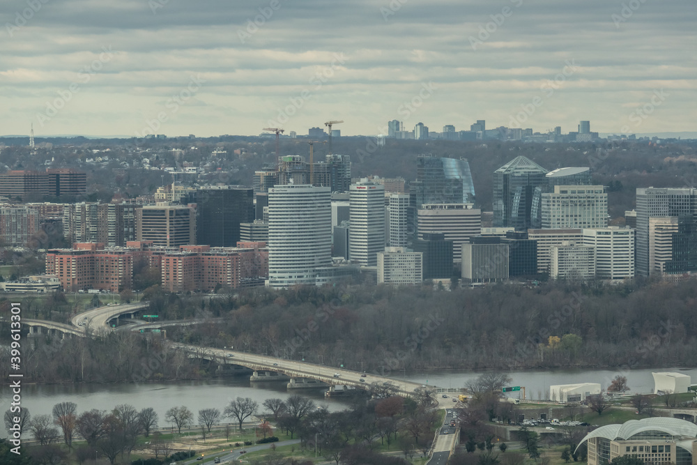 Aerial view of Downtown Arlington, Virginia, USA on clouds background.