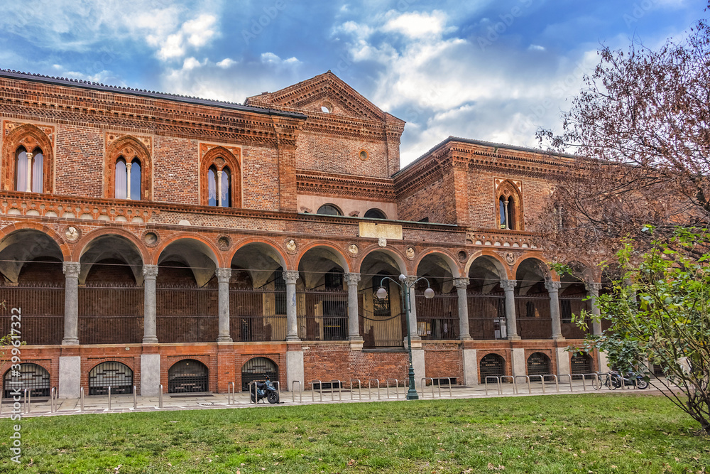 The exterior of the University of Milan. University of Milan is based in famous La Ca Granda - huge Ospedale Maggiore complex. Milan, Lombardy, Italy.