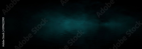Dramatic dark background. Reflection of light on the water. Smoke Fog, rays, the moon. Empty night scene, landscape, river, clouds. 