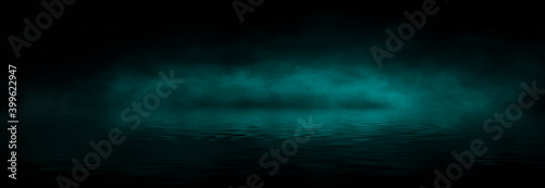 Dramatic dark background. Reflection of light on the water. Smoke Fog, rays, the moon. Empty night scene, landscape, river, clouds. 