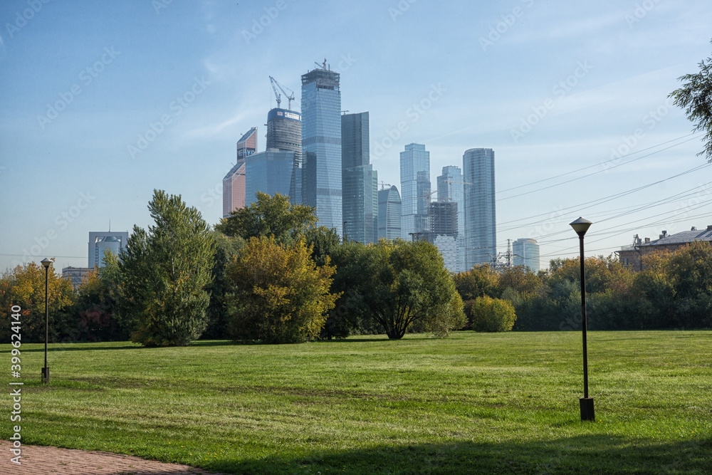 Moscow Сity in summer on the background of grass Moscow Сity in summer on the background of grass