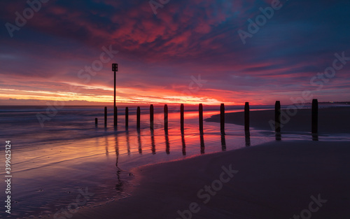 Colourful sunrise over Blyth Beach on the coast of Northumberland  England  UK.