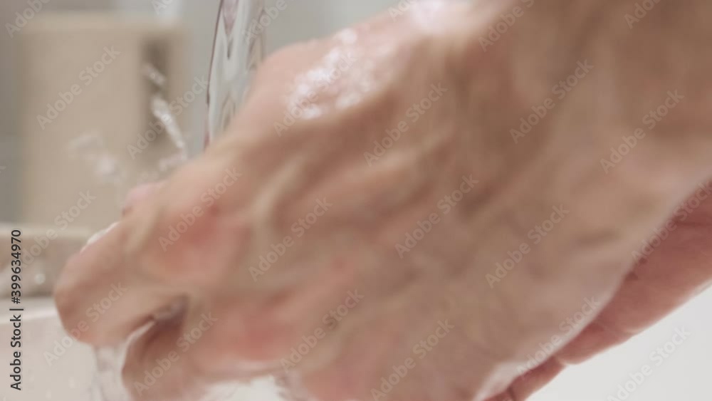 Washing Hands With Bar of Soap Under Water Close Up Washing Hands With Bar of Soap Under Water Close Up