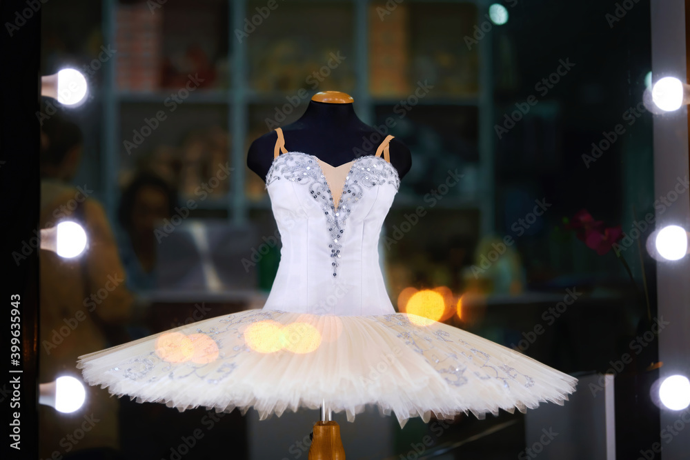 White ballet tutu on display in ballet store accessory. Showcase of