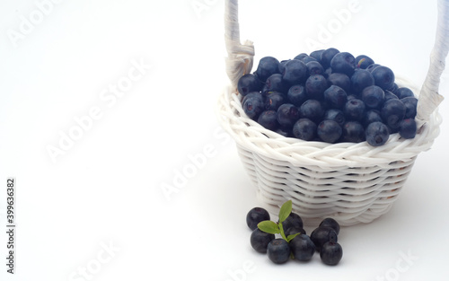 fresh ripe blueberry in wooden basket on table