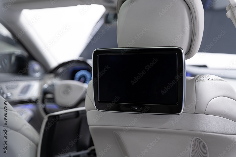 Modern luxury car interior with empty touchscreen monitor with copy space. Modern luxury car interior with empty touchscreen monitor with copy space.