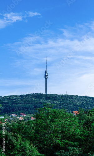 Avala mountain in Belgrade, Serbia with blue sky and white clouds. Summer day at the mountain.