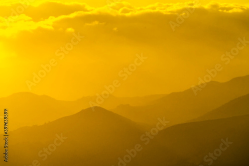 Yellow Sunset with Hills, Mountains, silhouette